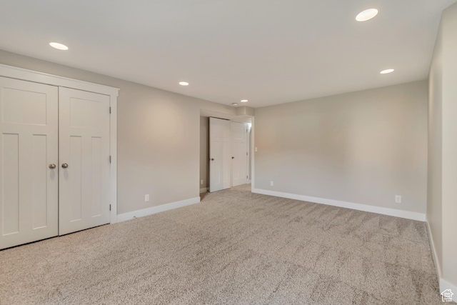 11968 N Ithica Dr, Highland, UT 84003 - unfurnished bedroom featuring two closets, carpet flooring, baseboards, and recessed lighting