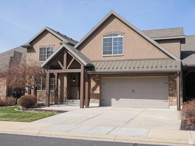 220 S 1970 E, Heber City, UT 84032 - view of front of property featuring a standing seam roof, stucco siding, metal roof, stone siding, and concrete driveway