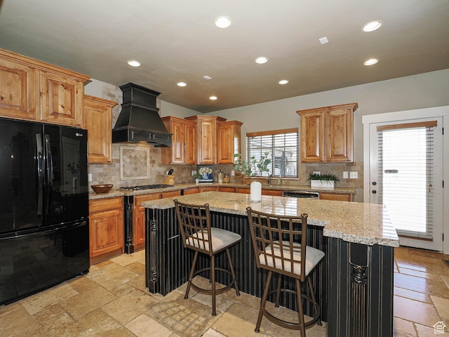 220 S 1970 E, Heber City, UT 84032 - kitchen featuring custom exhaust hood, recessed lighting, a center island, freestanding refrigerator, and stone tile flooring