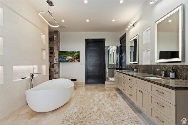 1449 S Devonshire Dr, Salt Lake City, UT 84108 - full bathroom with a sink, tasteful backsplash, double vanity, and a freestanding tub