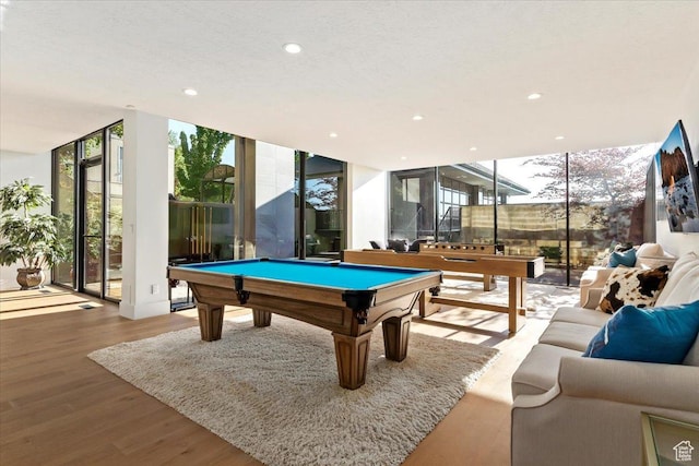 1449 S Devonshire Dr, Salt Lake City, UT 84108 - game room with wood finished floors, floor to ceiling windows, billiards, and plenty of natural light