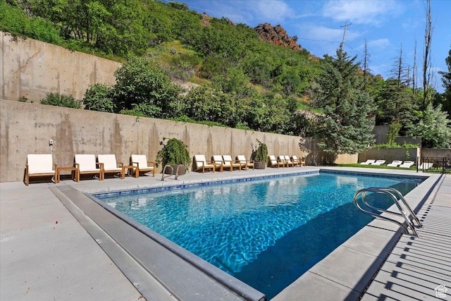 1449 S Devonshire Dr, Salt Lake City, UT 84108 - view of pool featuring a patio area, a fenced in pool, and fence