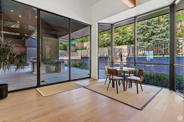 1449 S Devonshire Dr, Salt Lake City, UT 84108 - unfurnished sunroom with outdoor dining space and an outdoor kitchen