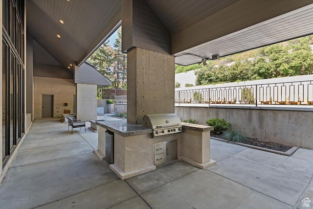 1449 S Devonshire Dr, Salt Lake City, UT 84108 - view of patio / terrace featuring exterior kitchen, fence, and area for grilling