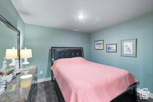 8836 W 3200 S, Cedar City, UT 84720 - bedroom featuring baseboards