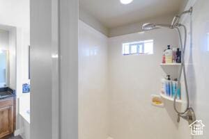 8836 W 3200 S, Cedar City, UT 84720 - full bathroom featuring a tub and walk in shower