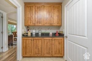 8836 W 3200 S, Cedar City, UT 84720 - kitchen with brown cabinets and dark countertops