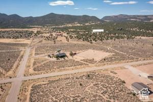 8836 W 3200 S, Cedar City, UT 84720 - birds eye view of property with a mountain view and view of desert