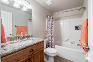 8836 W 3200 S, Cedar City, UT 84720 - full bathroom with toilet, shower / tub combo, and vanity