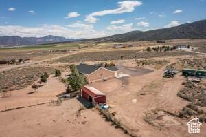 8836 W 3200 S, Cedar City, UT 84720 - drone / aerial view featuring a rural view, a mountain view, and a desert view