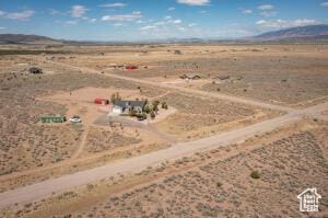 8836 W 3200 S, Cedar City, UT 84720 - birds eye view of property featuring view of desert, a mountain view, and a rural view