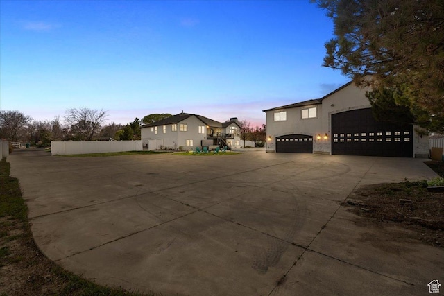 1178 W 13040 S, Riverton, UT 84065 - traditional-style house with stucco siding, fence, and concrete driveway