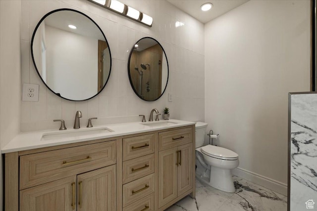 1178 W 13040 S, Riverton, UT 84065 - full bathroom featuring marble finish floor, toilet, a sink, and double vanity