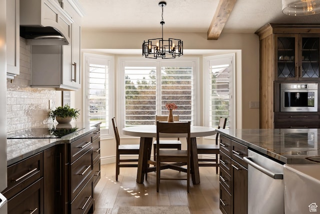 1178 W 13040 S, Riverton, UT 84065 - dining area featuring plenty of natural light, beam ceiling, and a notable chandelier