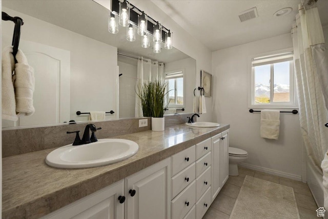 1178 W 13040 S, Riverton, UT 84065 - full bath with double vanity, visible vents, toilet, and a sink