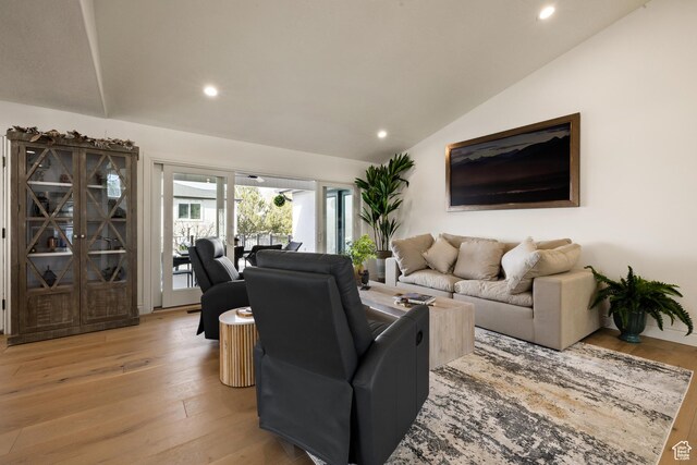1178 W 13040 S, Riverton, UT 84065 - living room featuring recessed lighting, vaulted ceiling, and light wood-style flooring