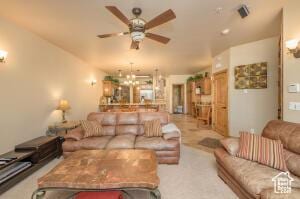 565 S Vasels Rd E Unit 6G, Brian Head, UT 84719 - living area featuring ceiling fan with notable chandelier