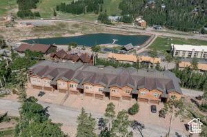 565 S Vasels Rd E Unit 6G, Brian Head, UT 84719 - drone / aerial view featuring a water view and a residential view