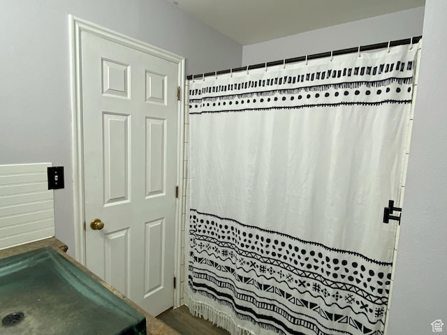 bathroom with a shower with curtain