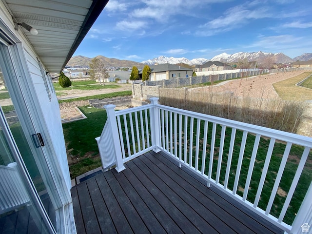 wooden terrace featuring a mountain view