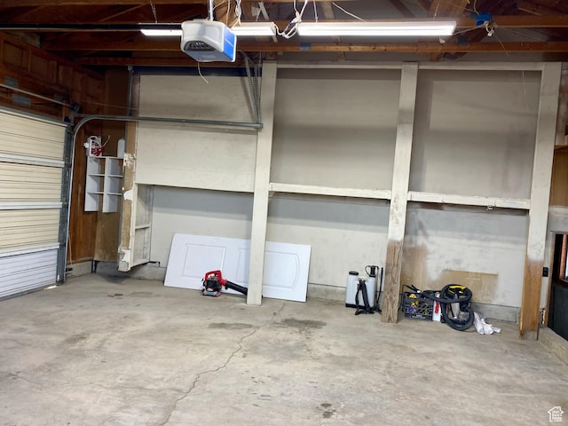 garage featuring a garage door opener