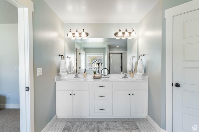 81 E 600 N, Mapleton, UT 84664 - full bath with baseboards, a sink, double vanity, and a stall shower