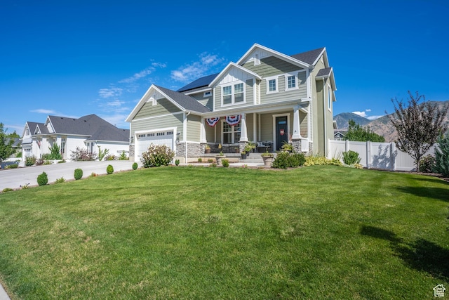 81 E 600 N, Mapleton, UT 84664 - craftsman house featuring fence, a front lawn, board and batten siding, driveway, and covered porch