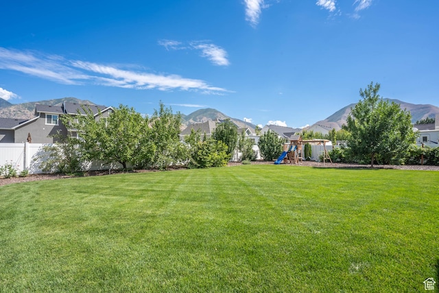 81 E 600 N, Mapleton, UT 84664 - view of yard featuring a fenced backyard, a mountain view, and a playground