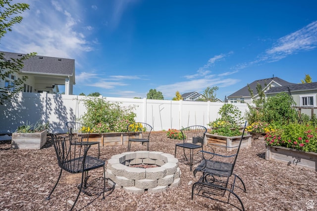 81 E 600 N, Mapleton, UT 84664 - view of patio featuring a garden, fence, and an outdoor fire pit