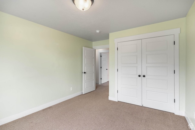 81 E 600 N, Mapleton, UT 84664 - unfurnished bedroom featuring light colored carpet, baseboards, and a closet