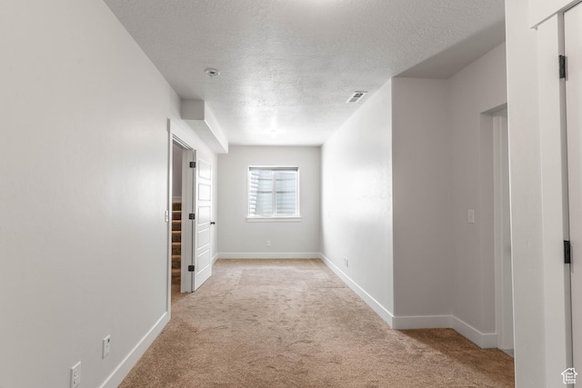 81 E 600 N, Mapleton, UT 84664 - corridor featuring baseboards, carpet flooring, a textured ceiling, and visible vents