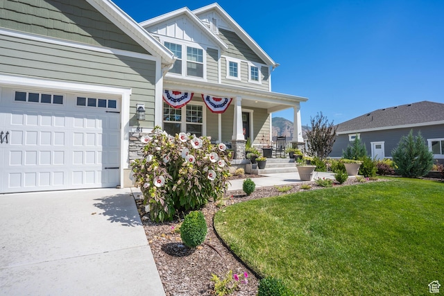 81 E 600 N, Mapleton, UT 84664 - craftsman-style home featuring concrete driveway, covered porch, a garage, board and batten siding, and a front yard