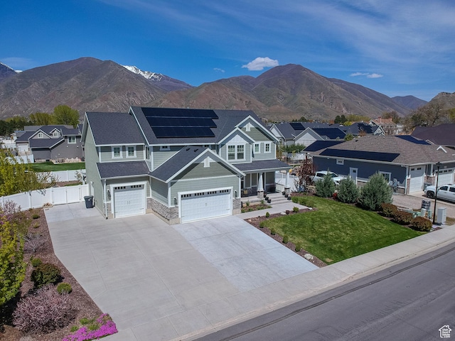 81 E 600 N, Mapleton, UT 84664 - view of front facade featuring fence, a residential view, driveway, and a front yard