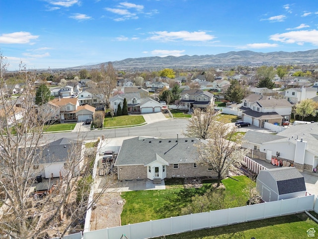 birds eye view of property featuring a residential view and a mountain view