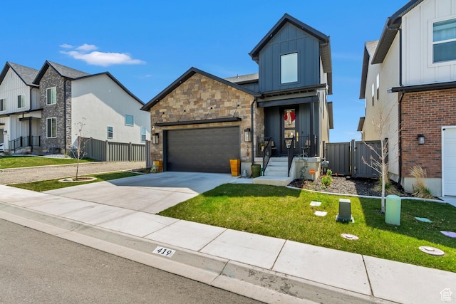 419 W 850 N, Farmington, UT 84025 - view of front of property featuring driveway, board and batten siding, a front yard, a garage, and fence