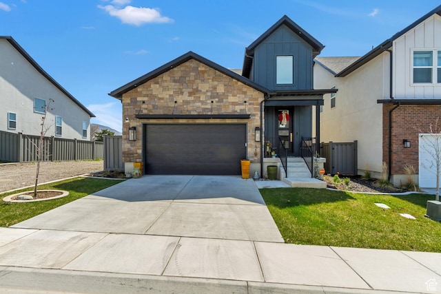 view of front facade featuring an attached garage, board and batten siding, fence, concrete driveway, and a front lawn