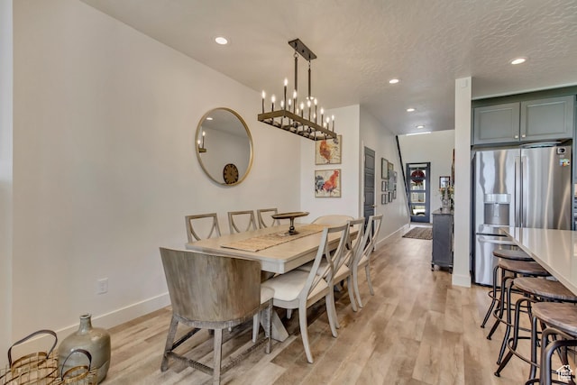 419 W 850 N, Farmington, UT 84025 - dining space with recessed lighting, light wood finished floors, a textured ceiling, and baseboards