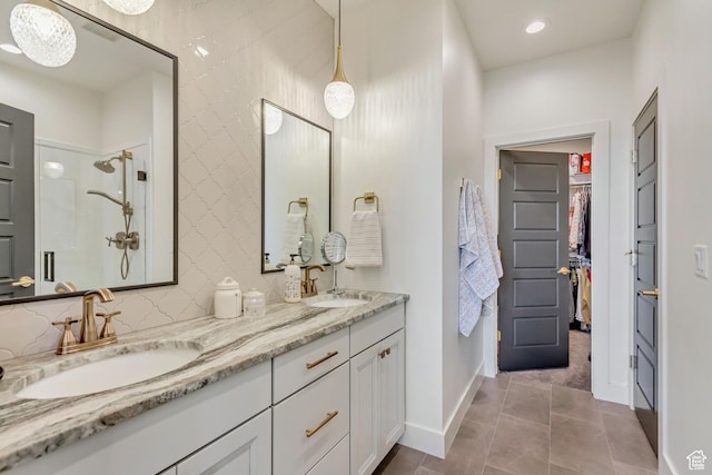 419 W 850 N, Farmington, UT 84025 - bathroom featuring a walk in shower, double vanity, a sink, and a walk in closet