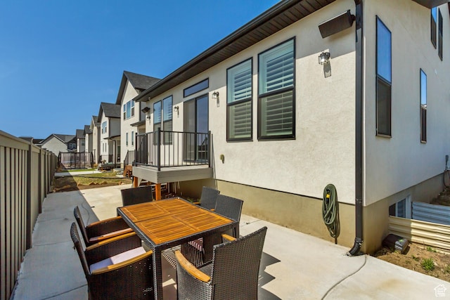 419 W 850 N, Farmington, UT 84025 - view of patio / terrace featuring fence, a residential view, and outdoor dining area