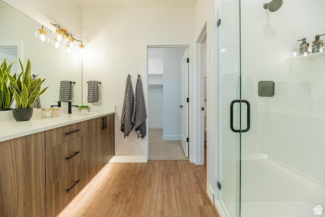 4342 W 5430 S Unit B, Roy, UT 84067 - full bath with a stall shower, vanity, wood finished floors, and baseboards