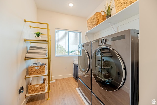 4342 W 5430 S Unit B, Roy, UT 84067 - laundry area with washing machine and dryer, baseboards, light wood finished floors, and recessed lighting