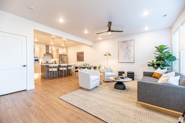 4342 W 5430 S Unit B, Roy, UT 84067 - living room featuring light wood-style floors, ceiling fan, recessed lighting, and baseboards