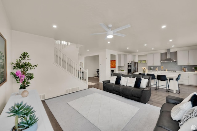 977 S 1480 W, Provo, UT 84601 - living room featuring recessed lighting, stairway, light wood-style flooring, and ceiling fan