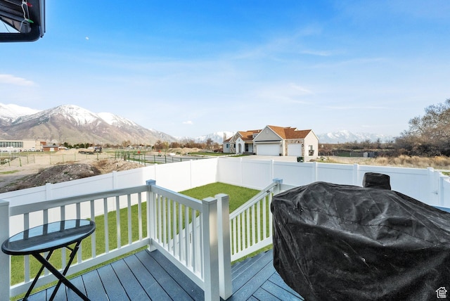 977 S 1480 W, Provo, UT 84601 - deck featuring area for grilling, a fenced backyard, a mountain view, and a lawn