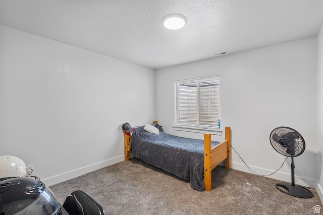 bedroom featuring carpet, visible vents, and baseboards