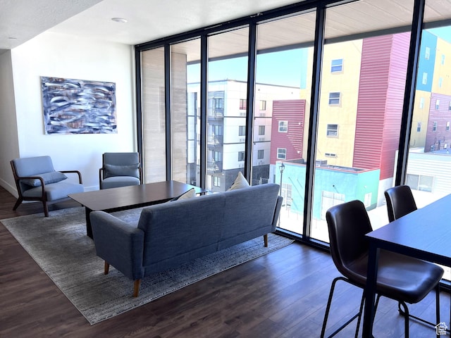 933 S Washington St Unit 107, Salt Lake City, UT 84101 - living area with floor to ceiling windows and dark wood finished floors
