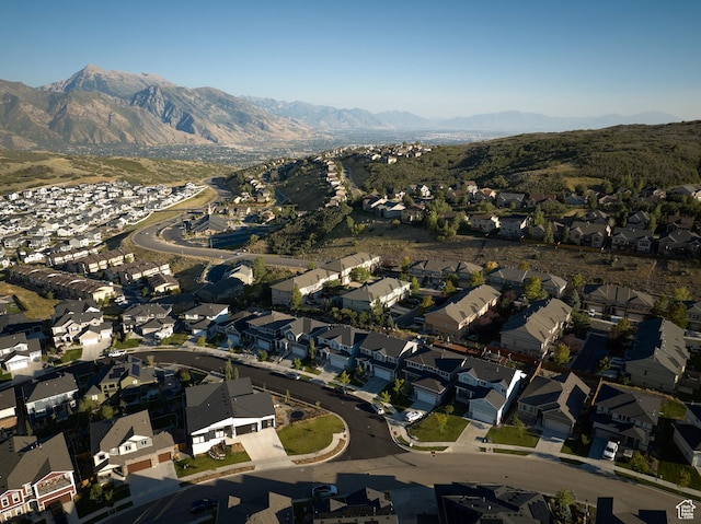 aerial view with a mountain view and a residential view