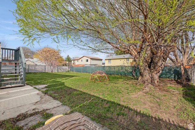 8235 S 1640 W, West Jordan, UT 84088 - view of yard featuring a fenced backyard and stairway