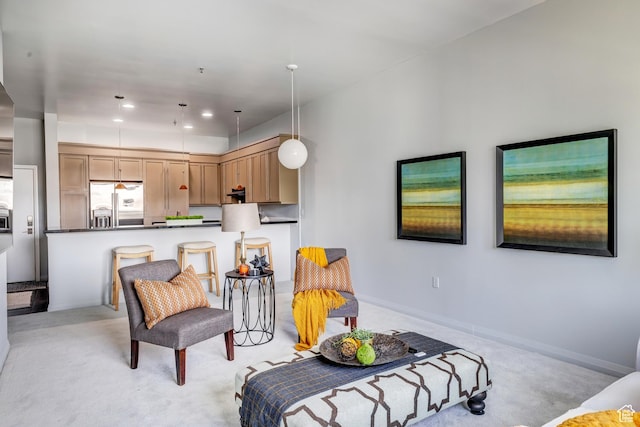 interior space featuring light carpet, recessed lighting, and baseboards