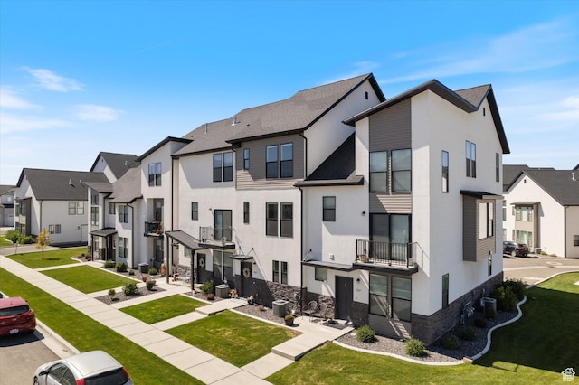 exterior space featuring cooling unit and a residential view
